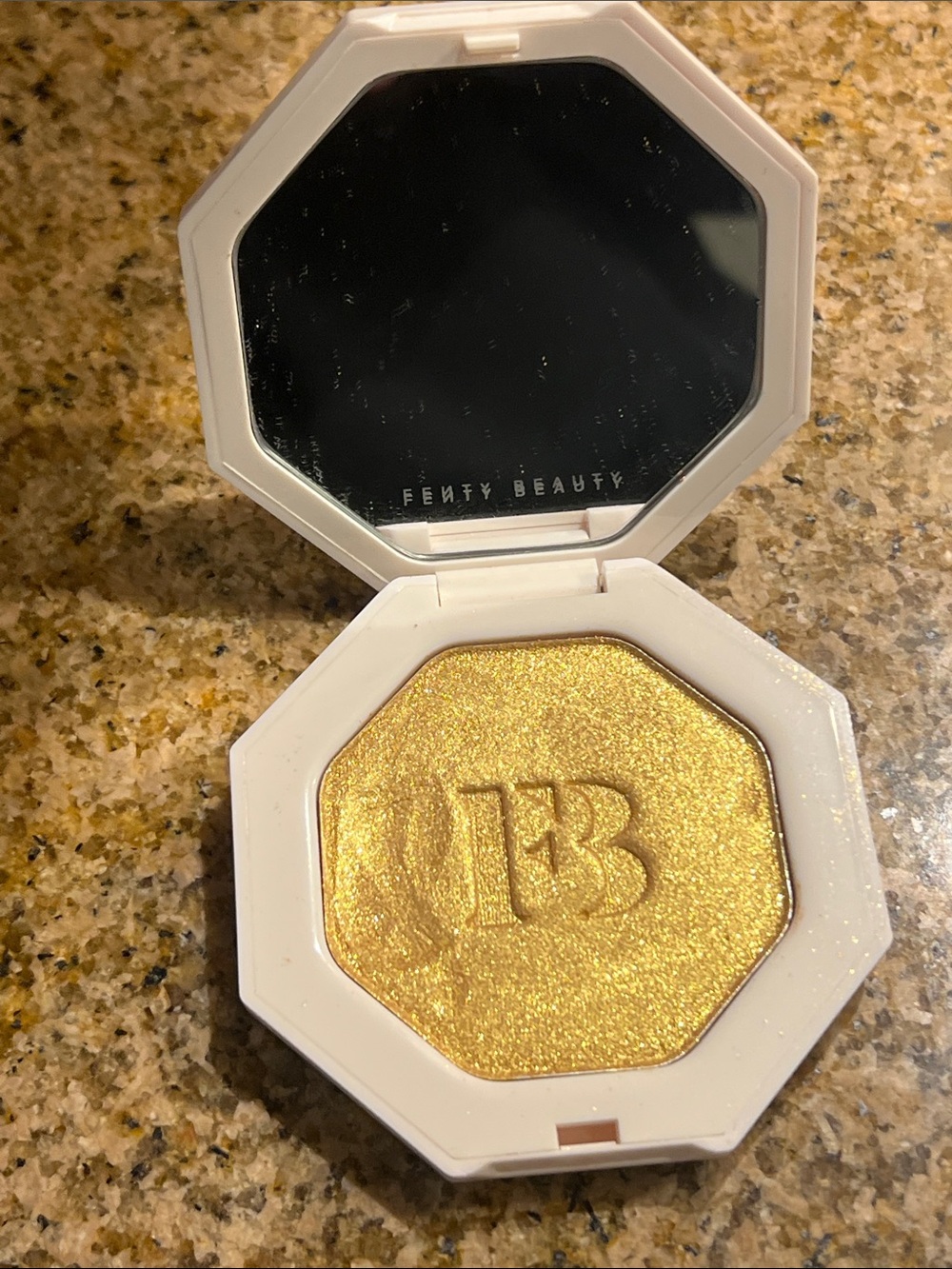 Fenty Beauty Shimmering Metallic Gold Highlighter powder “Trophy Wife”